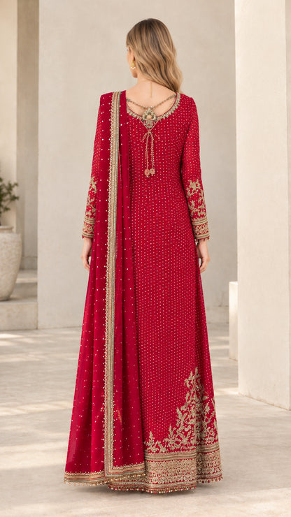 Back view of ruby red formal maxi dress highlighting back neckline details and drape