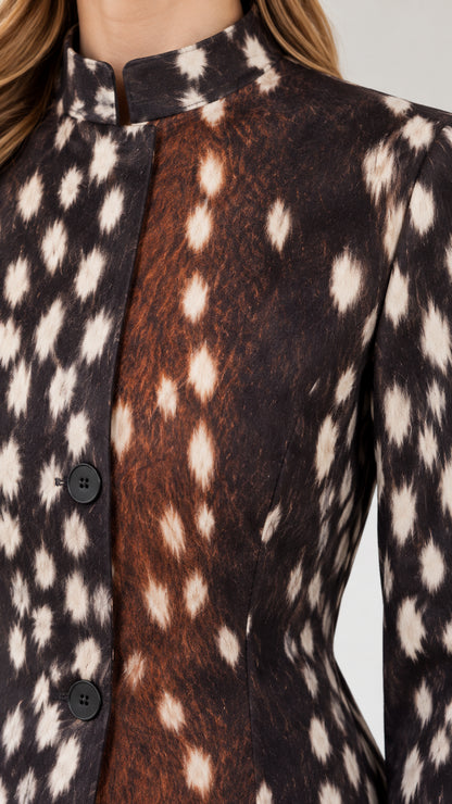 Close-up detail of stand collar and button front on brown spotted print jacket