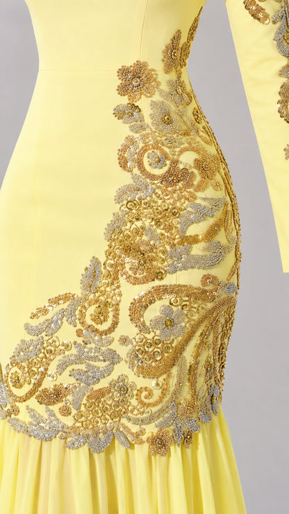 Close-up detail of metallic gold floral embroidery on the hip and waist
