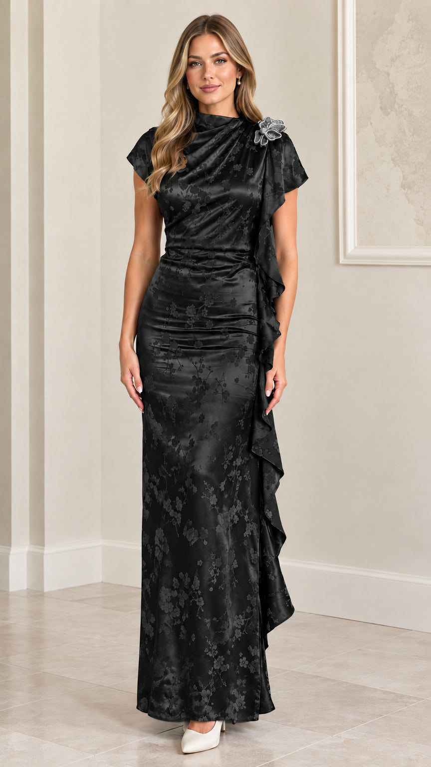 Model wearing Black satin floral jacquard cap sleeve ruffle maxi dress