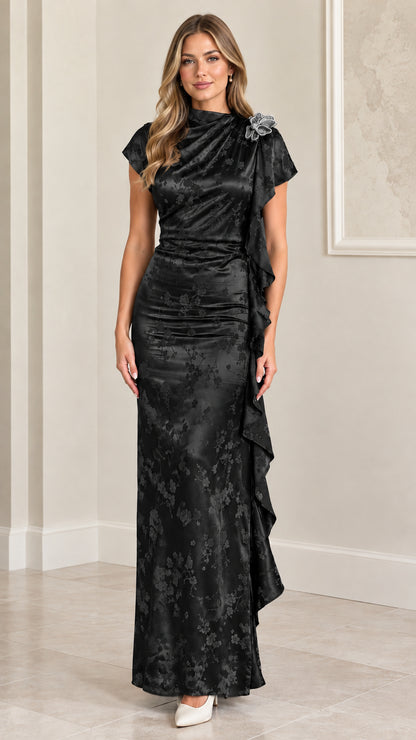 Model wearing Black satin floral jacquard cap sleeve ruffle maxi dress