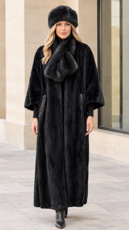 Full-length view of women's maxi faux fur coat in classic black