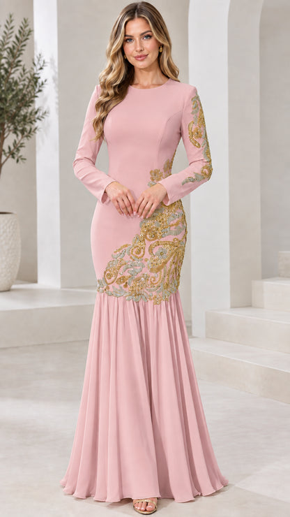 Model wearing blush pink long sleeve evening gown with gold embroidery
