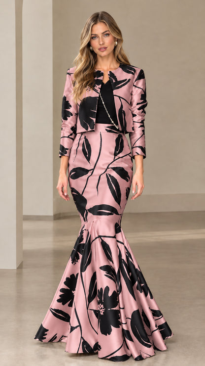 Front view of blush pink and black floral cropped jacket and mermaid skirt set