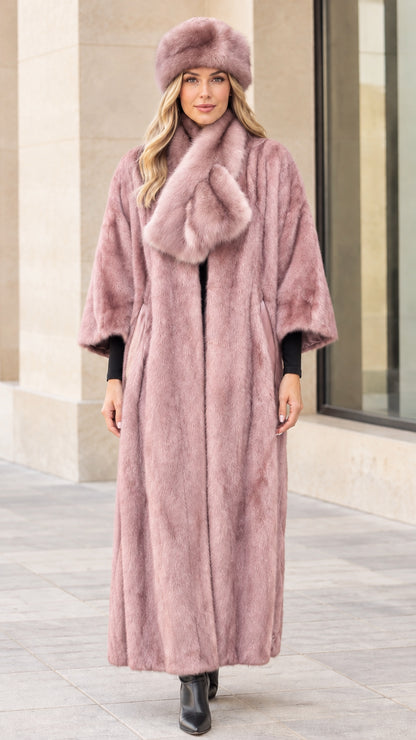 Full-length view of women's maxi faux fur coat in dusty rose pink