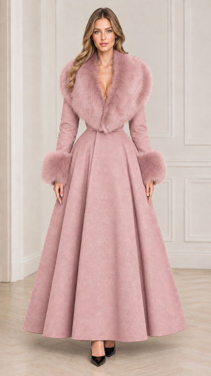 Model wearing dusty pink maxi coat with matching plush fur trim