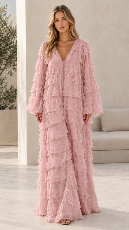 Model wearing dusty pink tiered ruffle long sleeve maxi dress