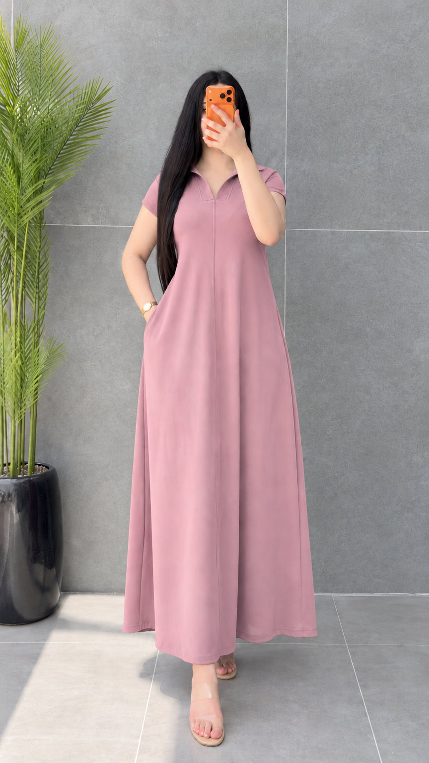 Front view of woman modeling Dusty Pink short sleeve polo collar maxi dress