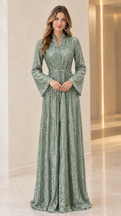 Model wearing sage green sequin long bell sleeve maxi dress with tie belt