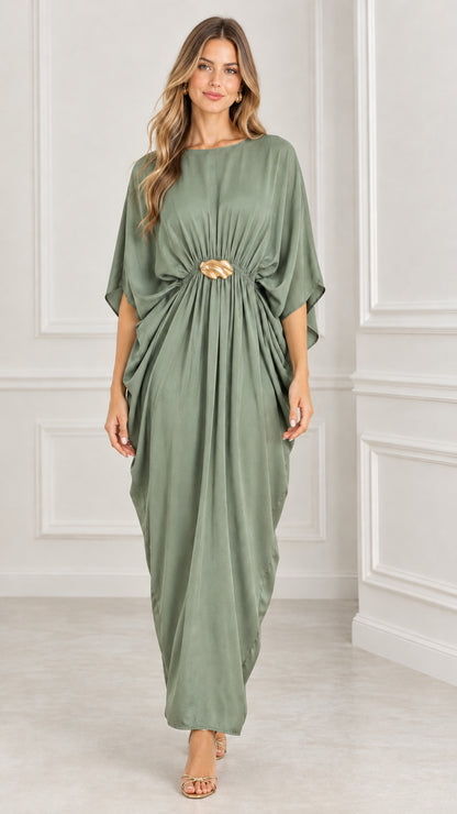 Front view of sage green draped kaftan maxi dress with gold buckle accent