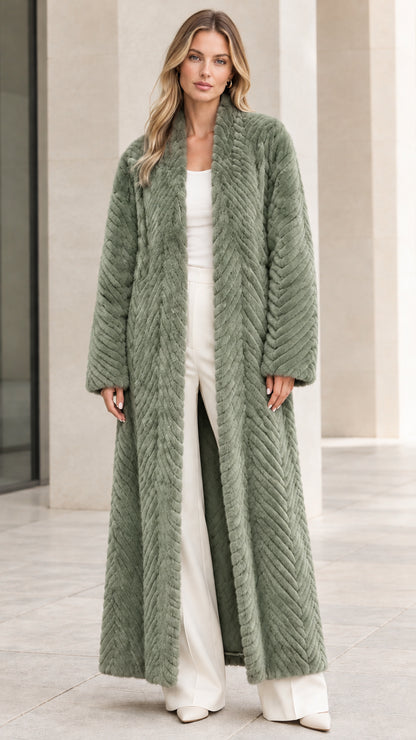 Front view of model wearing sage green chevron textured faux fur maxi coat