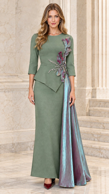 Front view of sage green formal evening gown with asymmetric peplum and side cascade