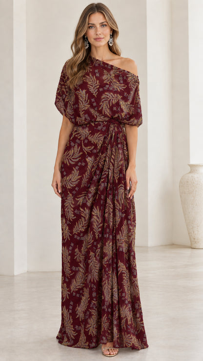 Woman wearing burgundy wine one-shoulder embroidered formal gown
