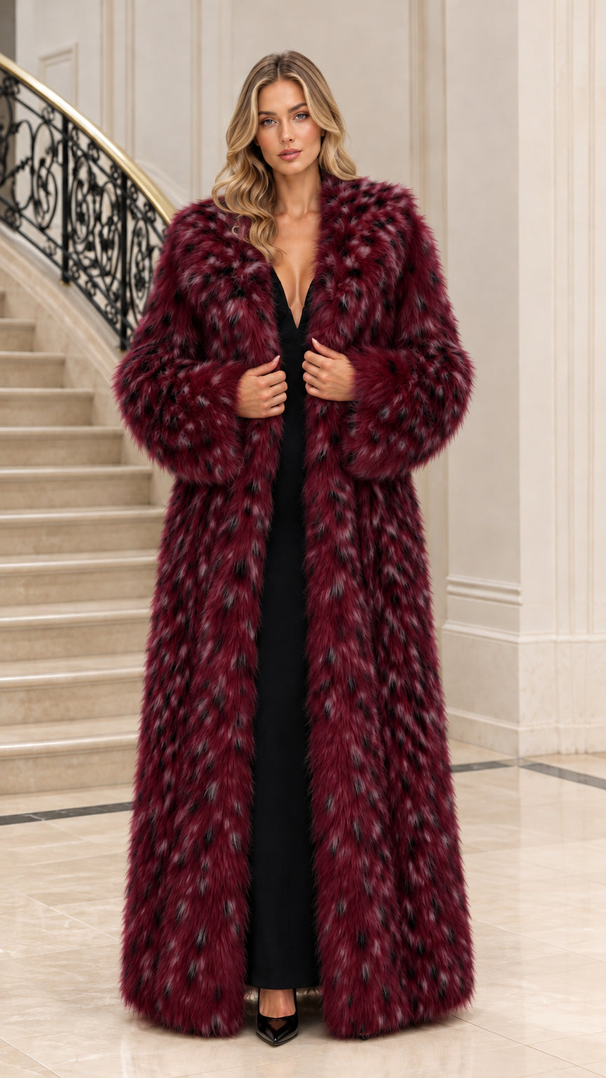 Front view of woman wearing rich burgundy wine spotted faux fur maxi coat