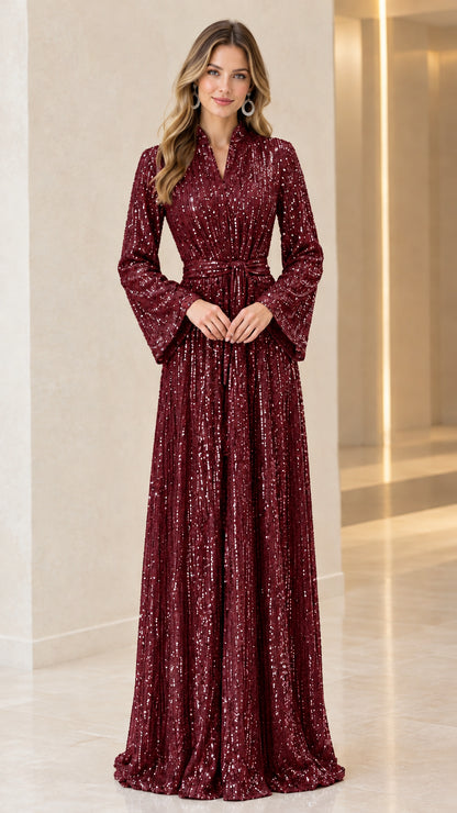 Model wearing burgundy wine red sequin long bell sleeve maxi dress with tie belt