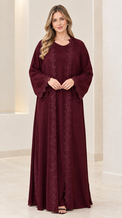 Front view of women's burgundy wine red lace-embellished abaya dress
