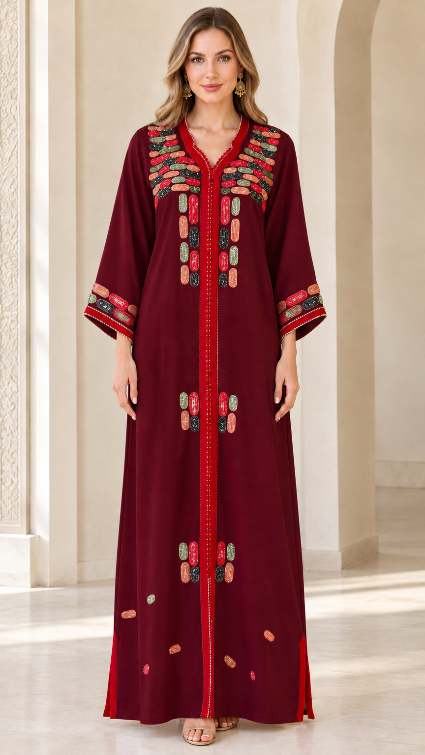 Front view of model wearing burgundy red embroidered maxi kaftan dress