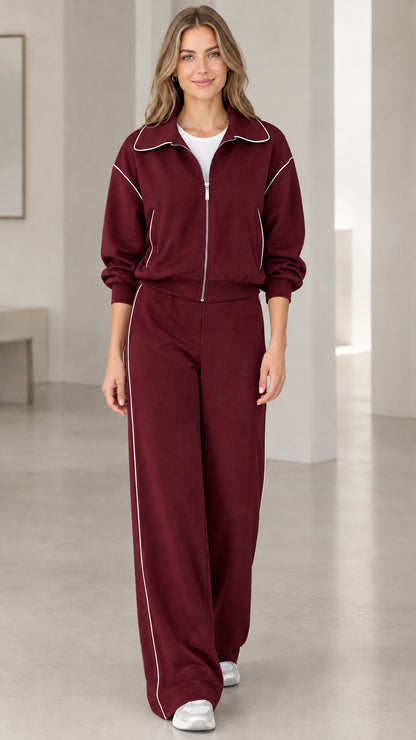 Front view of model wearing Burgundy wine red two-piece tracksuit set with contrast trim