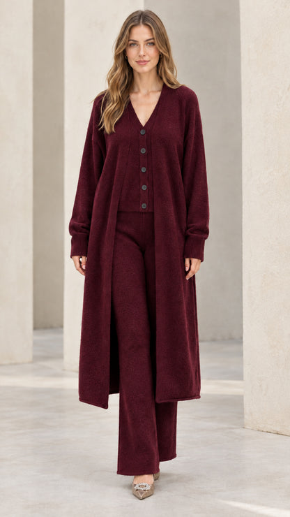 Front full-length view of model wearing burgundy wine 3-piece knit duster cardigan and pants set