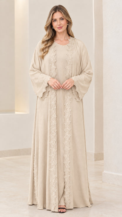 Front view of women's beige cream lace-embellished abaya dress