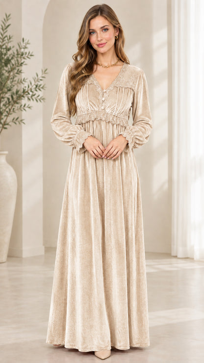 Front view of model wearing champagne beige velvet long sleeve maxi dress