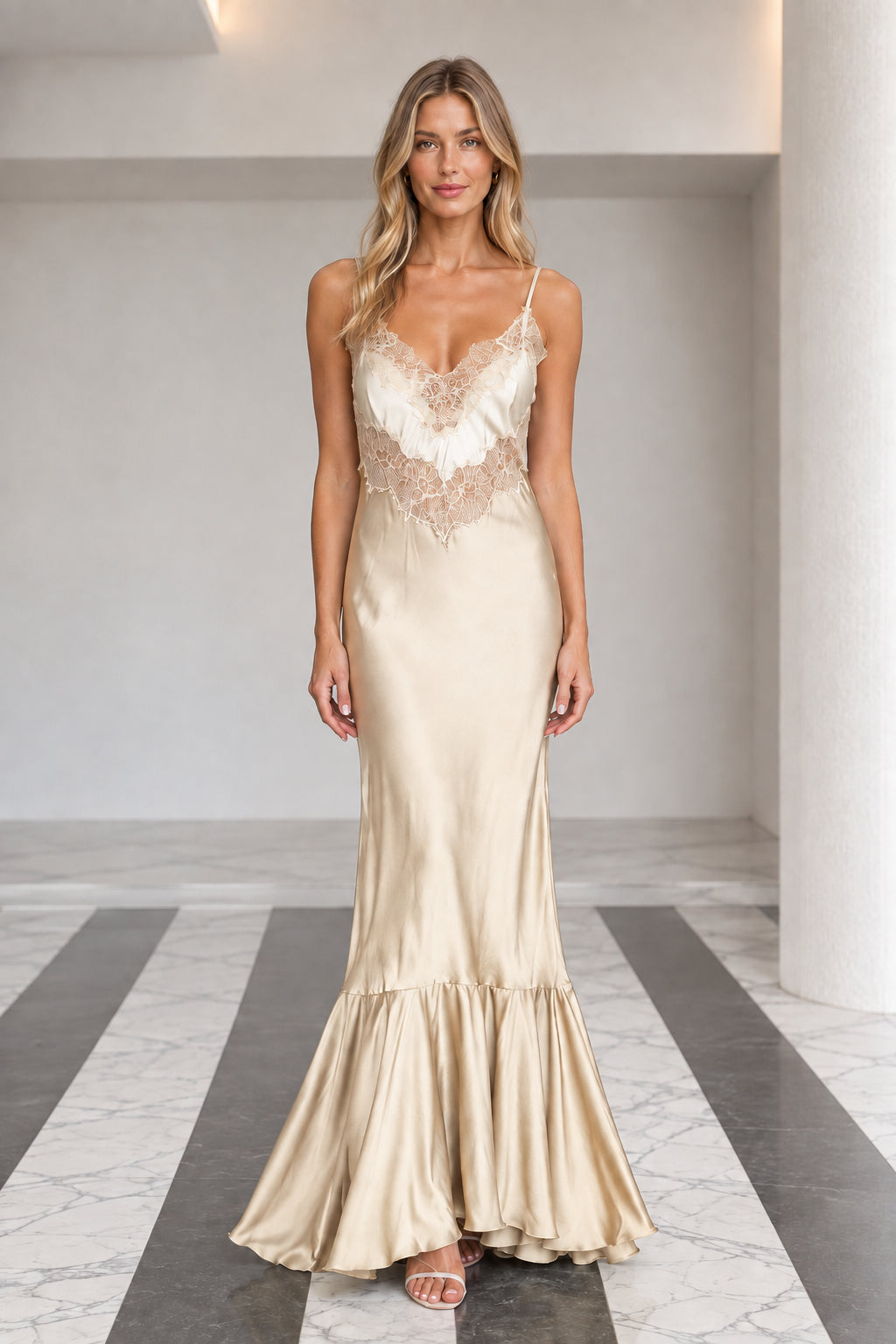Front view of champagne satin lace trim slip maxi dress with flounce hem