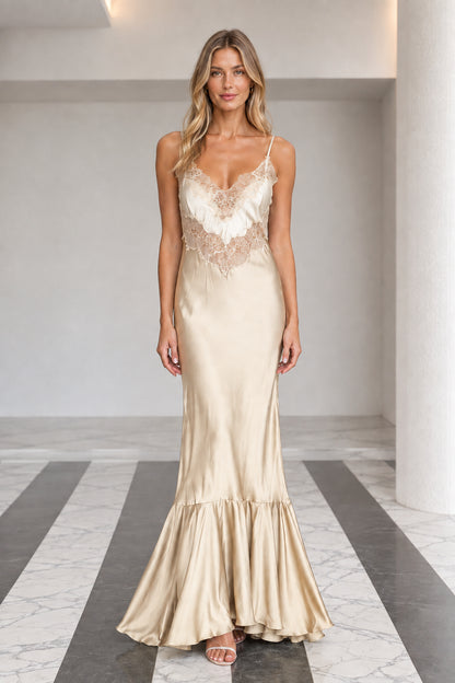 Front view of champagne satin lace trim slip maxi dress with flounce hem