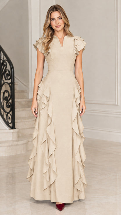 Full-length view of champagne beige flutter sleeve cascade ruffle maxi dress
